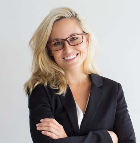 Girl with white hair in glasses in a black jacket
